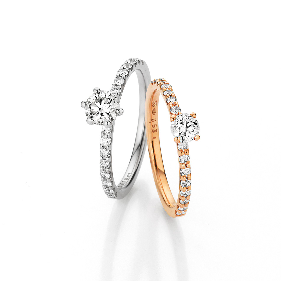 Solitärringe in Rotgold und Platin