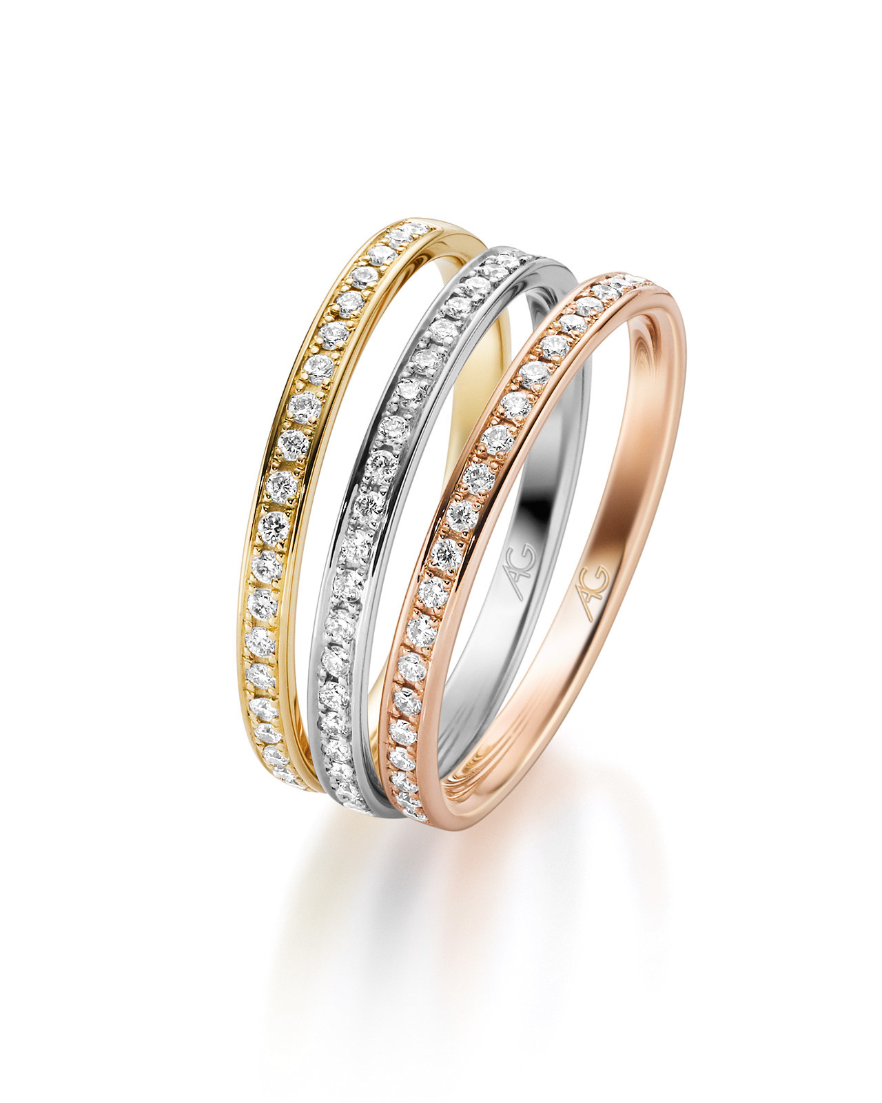 Drei rundum gefasste Memoire-Ringe aus Gelbgold, Weissgold und RosÃ©gold